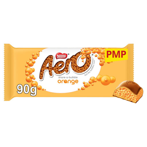 Nestlé Nestle Nestlé Aero Orange 90g share-a-bubble candy wrapper with a piece of the candy shown on the bottom right, on a white background.